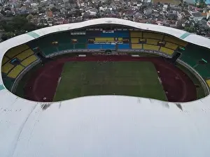 White Bridge Prints: Aerial View of The largest stadium of Bekasi from drone when sunset and noise cloud