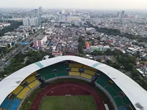 White Bridge Prints: Aerial View of The largest stadium of Bekasi from drone when sunset and noise cloud
