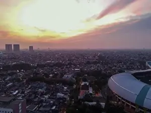 White Bridge Prints: Aerial View of The largest stadium of Bekasi from drone when sunset and noise cloud