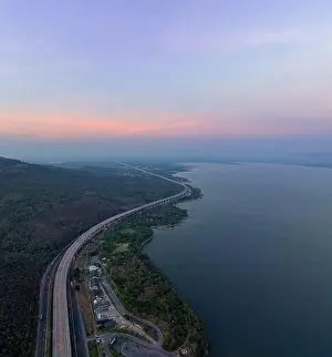 Transportation System Prints: aerial view light on super highway Along the Lam Takhong Dam at twilight