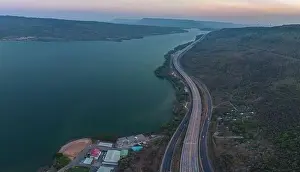 Transportation System Prints: aerial view light on super highway Along the Lam Takhong Dam at twilight
