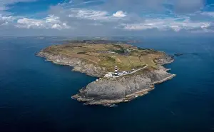 Cork County Prints: Aerial view of the lighthouse and the Old Head of Kinsale in County Cork of western Ireland