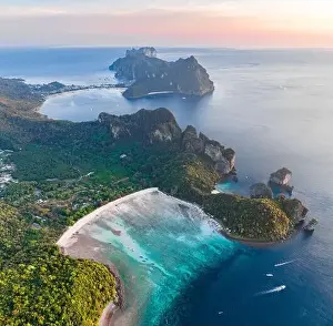 Phi Phi Islands Prints: Aerial view of Loh Lana Bay at sunset in koh Phi Phi islands, Krabi, Thailand