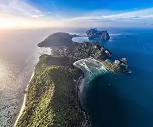 Phi Phi Islands Prints: Aerial view of Loh Lana Bay at sunset in koh Phi Phi islands, Krabi, Thailand
