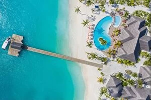 Images Dated 2nd August 2019: Aerial view of Maldives island, luxury water villas resort and wooden pier