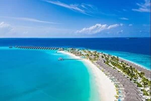 Images Dated 2nd August 2019: Aerial view of Maldives island, luxury water villas resort and wooden pier