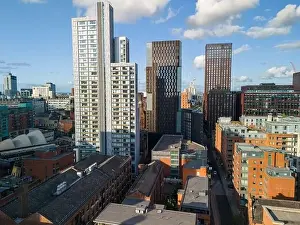 High Rise Building Prints: Aerial view of Manchester cityscape with old and new buildings