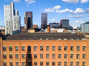 High Rise Building Prints: Aerial view of Manchester cityscape with old and new buildings