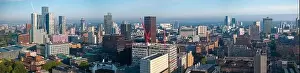 Beetham Tower Prints: Aerial view of Manchester cityscape with skyscrapers and construction sites