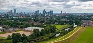 Aerial view of Manchester cityscape with skyscrapers and construction sites