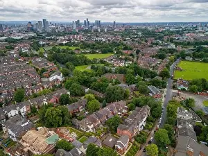 Beetham Tower Prints: Aerial view of Manchester cityscape with skyscrapers and construction sites