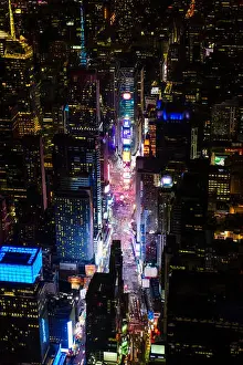 Nightfall Prints: Aerial view of Manhattan cityscape at night, New York, United States