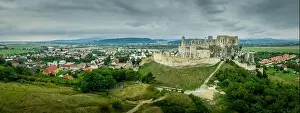 Renovated Prints: Aerial view of medieval ruined Beckov castle in Slovakia above the Vah river with Gothic chapel and stormy sky