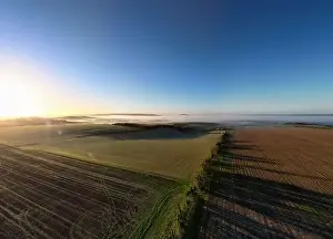Rural England Prints: An aerial view on a misty autumn morning over Cranborne Chase AONB in Wiltshire, UK