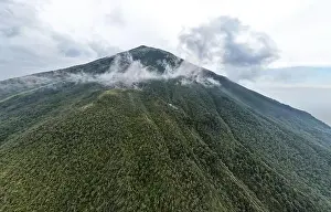 Central Java Prints: Aerial view of Mount Sindoro in Indonesia with noise cloud