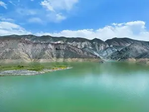 Aerial Lake Prints: Aerial view on mountain lake. Drone view water reservoir at mountain valley