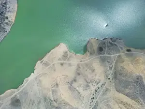 Aerial Lake Prints: Aerial view on mountain lake. Drone view water reservoir at mountain valley