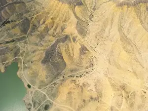Aerial Lake Prints: Aerial view on mountain lake. Drone view water reservoir at mountain valley