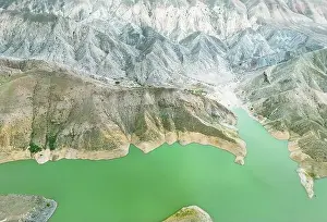 Aerial Lake Prints: Aerial view on mountain lake. Drone view water reservoir at mountain valley