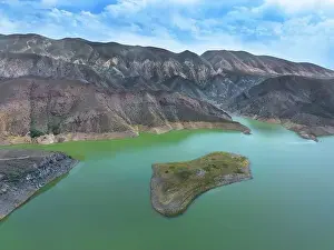 Aerial Lake Prints: Aerial view on mountain lake. Drone over water reservoir at mountain valley