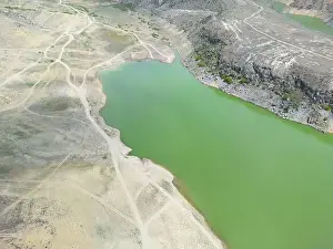 Aerial Lake Prints: Aerial view on mountain lake. Drone over water reservoir at mountain valley
