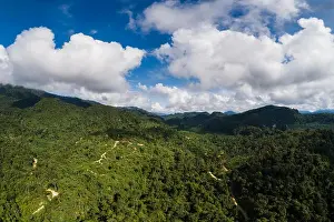 Sky Valley Prints: Aerial view of mountains in the rainforest of Malaysia on sunny day