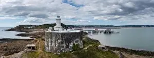 Swansea Bay Prints: aerial view of the Mumbles headland with the historic lighthouse and piers in Swansea Bay