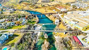 Verdant Prints: Aerial view of New Braunfels, Texas, USA, featuring the skyline of the city