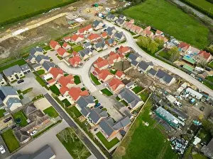 Aerial view of new bungalow hosing development seen in rural Cambridgeshire