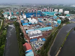 Green Forest Prints: Aerial view of Oil and gas industry - refinery after rain - factory - petrochemical plant