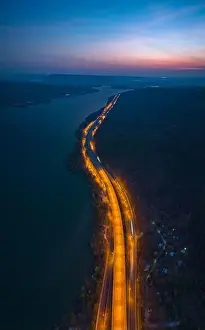Transportation System Prints: aerial view orange lights on the expressway along the route along the Lam Ta Khong Dam
