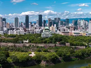 Feudal Prints: Aerial view of Osaka Castle and modern towers under midday light