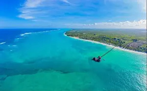 Villas Prints: Aerial view of palms on the sandy beach of Indian Ocean at sunny day