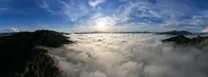Travel Background Prints: Aerial view Panorama of flowing fog waves on mountain tropical rainforest