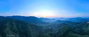 Travel Background Prints: Aerial view Panorama of flowing fog waves on mountain tropical rainforest