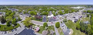 Aerial view panorama of Millis historic town center and Main Street in spring