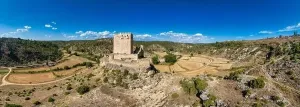 Judicial Prints: Aerial view of Paracuellos de la Vega Spanish medieval castle perched on a rock in Cuenca
