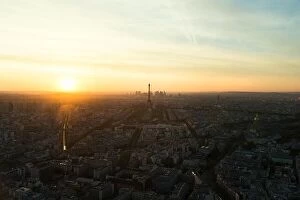 Images Dated 5th May 2016: Aerial view of Paris skyline with Eiffel Tower at sunset. Eiffel Tower is one of the most iconic
