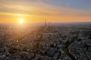 Aerial view of Paris skyline with Eiffel Tower at sunset in Paris, France