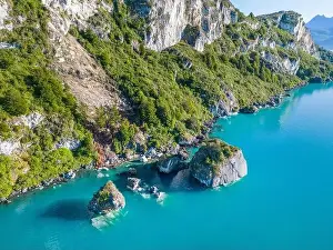 Rocky Shoreline Prints: Aerial view of the picturesque Marble Caves near Puerto Rio Tranquilo - Lago General Carrera