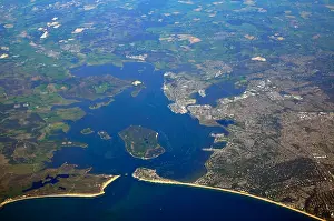 Sailing Prints: aerial view of poole harbour in dorset perched on the edge of world famous jurassic coast