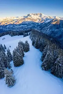 Seriana Valley Prints: Aerial view of the Presolana massif during a winter sunrise from Monte Pora