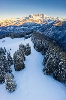 Seriana Valley Prints: Aerial view of the Presolana massif during a winter sunrise from Monte Pora