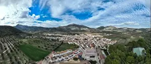 White Mountain Prints: aerial view of the pretty white village of Alfarnate in the province of Malaga, Spain