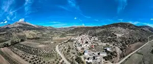 aerial view of the pretty white village of Alfarnatejo in the province of Malaga, Andalusia