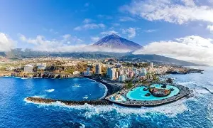 Puerto Prints: Aerial view with Puerto de la Cruz, in background Teide volcano, Tenerife island, Spain