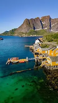 North Island Prints: An aerial view of a quaint Norwegian village nestled on the coast of Lofoten