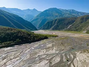 Vastness Prints: Aerial view of the remote Rio Sacambaya landscape with a huge riverbed
