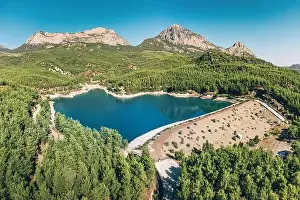 Summer Green Prints: Aerial view of the reservoir pond with beautiful bluish green water among the mountains