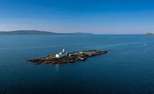 West Cork Prints: aerial view of the Roancarrigmore Island Lighthouse in Bantry Bay in County Cork
